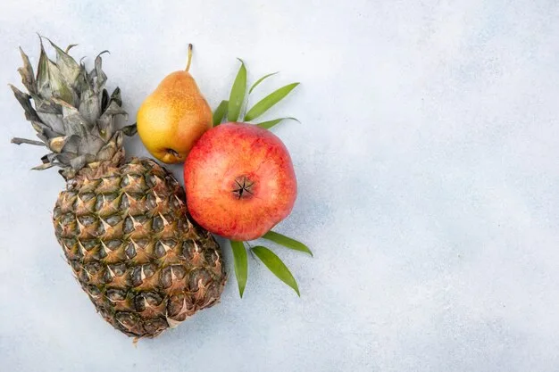 Free Photo | Top view of fruits as pineapple, pomegranate and peach on white surface with copy space
